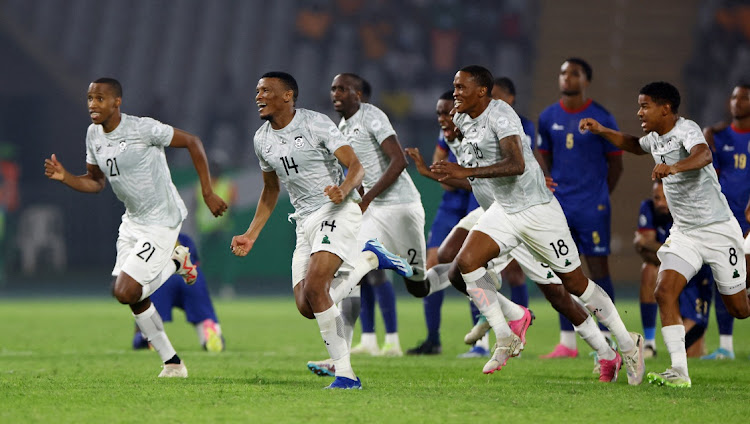 Bafana Bafana players celebrate after winning the penalty shootout in their Africa Cup of Nations quarterfinal agaist Cape Verde at Stade Charles Konan Banny in Yamoussoukro, Ivory Coast on Saturday night.