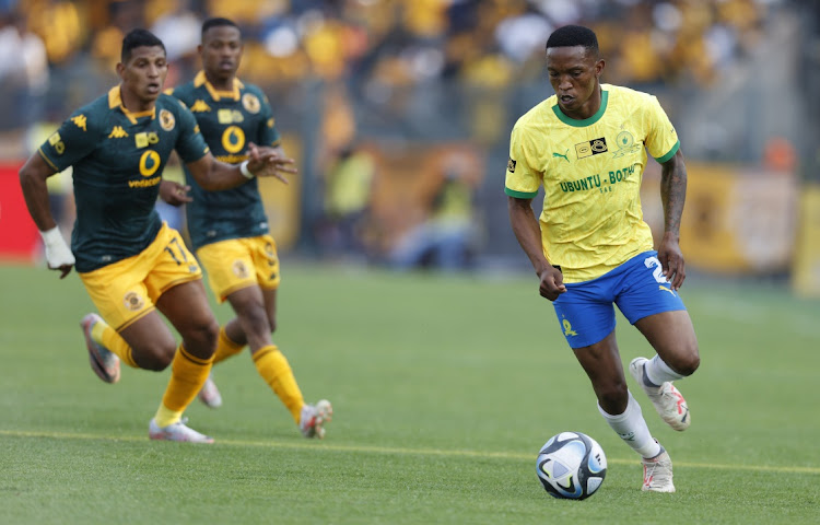 Grant Kekana of Mamelodi Sundowns in action with Edson Castollo and Ashley Du Preez of Kaizer Chiefs during the MTN8 semi final in September 2023