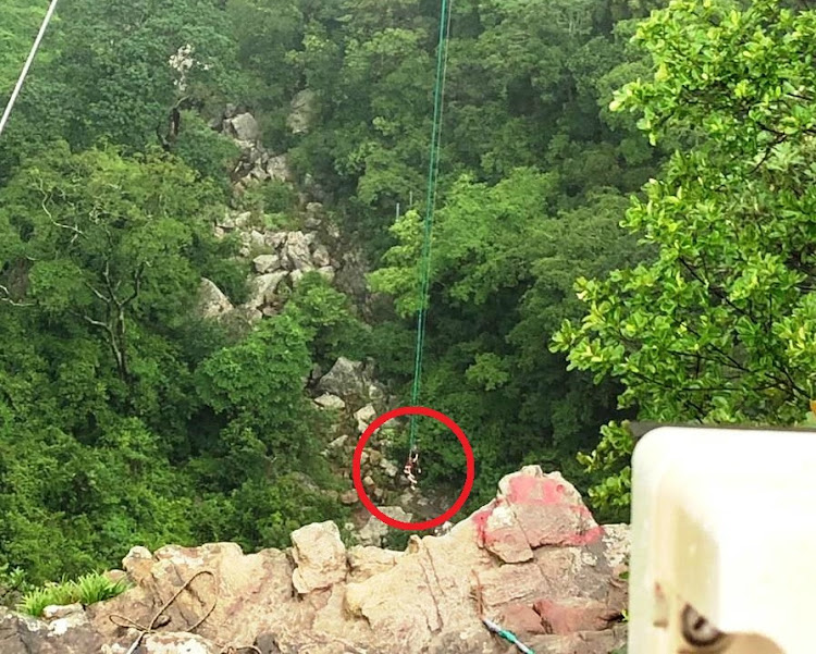 Teenager Jessica Bruwer dangles from a swing at Oribi Gorge after a winch motor malfunction on Wednesday.