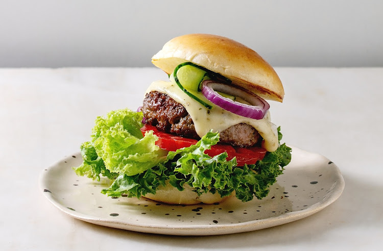 How do you know when a homemade burger is ready to flip in the pan? When the moisture bubbles to the surface, says our food editor.