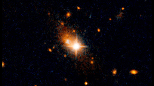 This image, taken by NASA's Hubble Space Telescope, reveals an unusual sight: a runaway quasar fleeing from its galaxy's central hub. A quasar is the visible, energetic signature of a black hole. Black holes cannot be observed directly, but they are the energy source at the heart of quasars — intense, compact gushers of radiation that can outshine an entire galaxy.