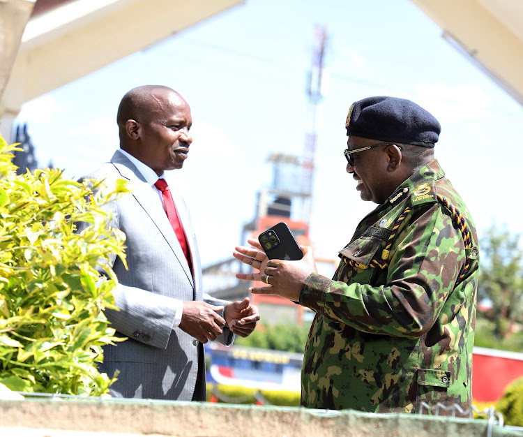 Interior Cabinet Secretary Kithure Kindiki engaging with Inspector-General of the National Police Service Japhet Koome at the GSU Training School in Embakasi , Nairobi on March 12, 2024