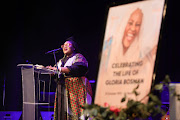 Musician-poet Moafrika Wa Makgatho performs a tribute at Gloria Bosman's memorial service.