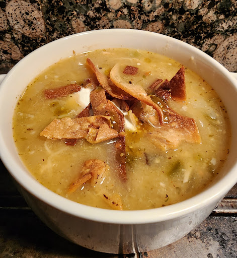 Fire Roasted White Chicken Chili with Monterey Jack Cheese, sour cream and tortilla strips. 