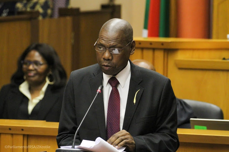 Health minister Zweli Mkhize delivers his budget vote in parliament on Friday.