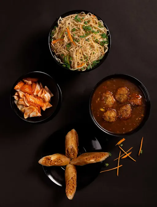 Veg Noodles With Manchurian, Spring Roll & Kimchi Salad