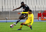 Orlando Pirates' Deon Hotto gets past a challenge in the Caf Confederation Cup match against JS Saoura at Stade du 5 Juillet 1962 in Algiers, Algeria on March 20 2022.