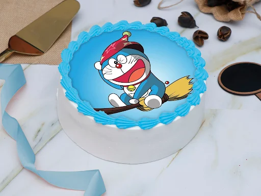 Doraemon On Flying Broom Stick Photo Cake