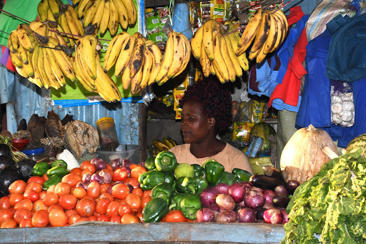 A woman at her grocery in Malaba along the Malaba-Ang'urai road.