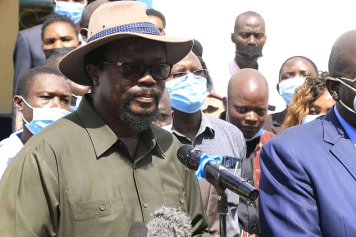 Kanduyi MP Wafula Wamunyinyi speaking at a past event at Bungoma DEB Primary School.