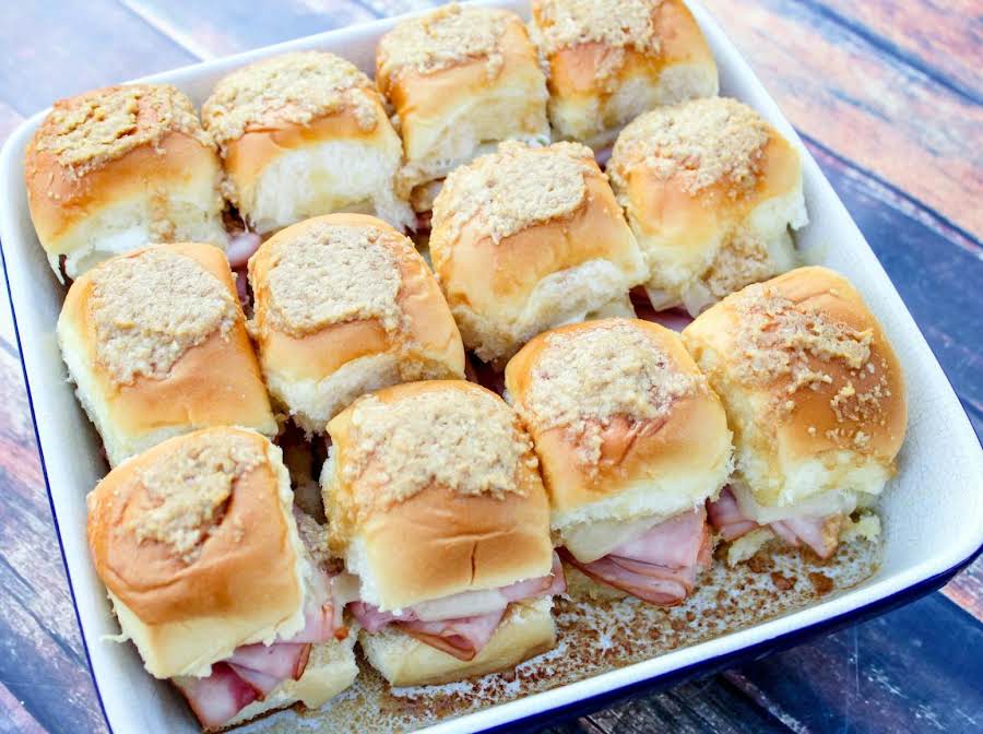 several-ham-and-cheese-sandwiches-stacked-on-top-of-each-other-in-a