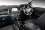 Luxurious cabin gains a soft-touch leather-trimmed dashboard. A Ford Sync3 infotainment system is standard.