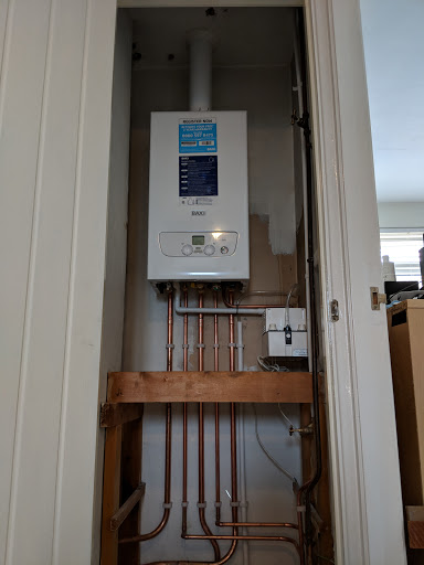 Baxi 600 series combi. Vertical flue. Condensate waste is pumped.