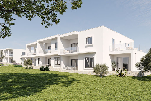 Buy this luxury apartment / penthouse in Lagoa (Portugal) - Modern white building with balconies, garden