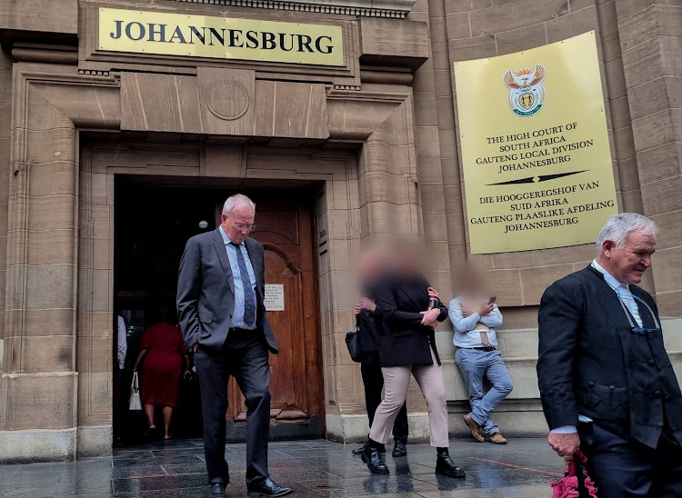 Prof Peter Beale and advocate Barry Roux leave the Johannesburg high court last year. File photo.