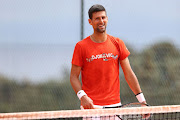 Novak Doković of Serbia smiles during a training session on day 2 of the Rolex Monte-Carlo Masters at Monte-Carlo Country Club on April 11, 2021 in Monte-Carlo, Monaco. 