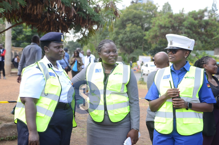 Kenya Police Service SSP Wilfrida Rotich, OCS Milimani inspector Susan Oola and chief inspector Teressia Ngetich during the traffic open day flag off at Milimani Law Courts on March 20, 2024./