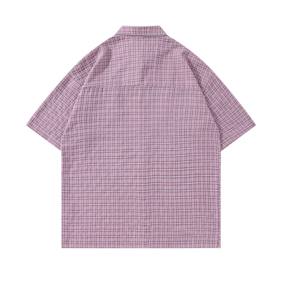 Camicia a maniche corte a quadri da uomo, perfetta per un look casual e alla moda. Comfort e stile per ogni occasione.