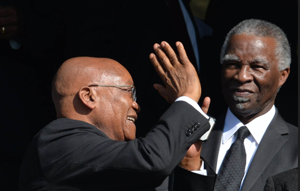 Former South African presidents Jacob Zuma and Thabo Mbeki during the funeral service of struggle icon Winnie Madikizela-Mandela on April 14 2018 in Johannesburg.