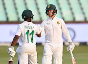 Kyle Verreynne congratulates Temba Bavuma after he scored his 50 in the third session of the first Test against Bangladesh at Kingsmead Stadium in Durban on March 31 2022.
