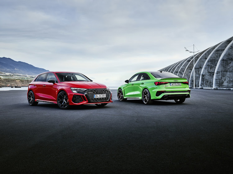 The new RS3 Sportback (left) and Sedan deliver more firepower and sporting swagger. The Sedan's colour is known as Kyalami Green, incidentally. Picture: Supplied