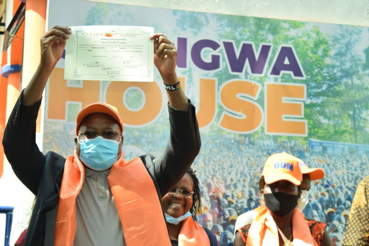 Boinchari electionCandidate Pavel Robert Oimeke holds the certificate handed over to him by the ODM party at the Chungwa House in Nairobi Friday 19.