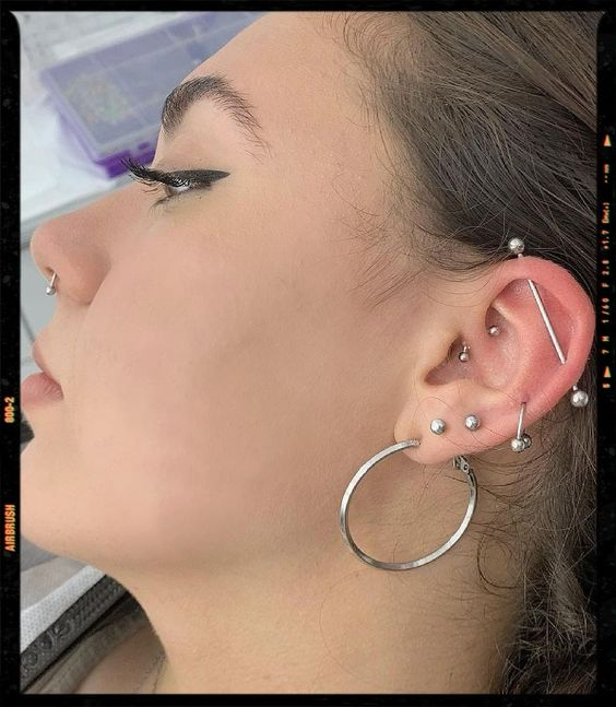 Lady rocks her barbell piercing