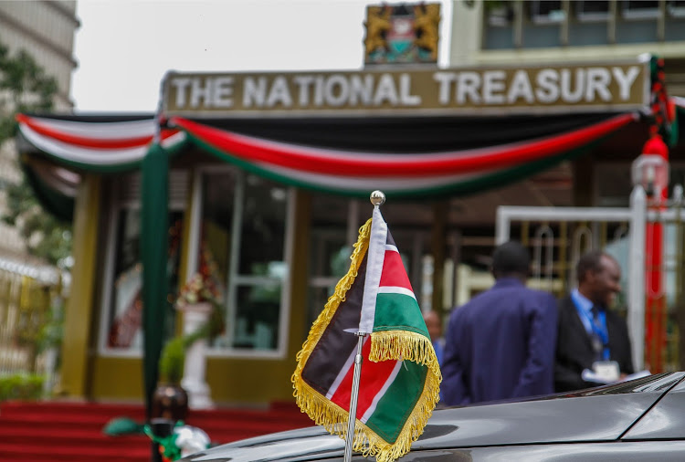 National treasury CS Henry Rotich car bearing the flag.