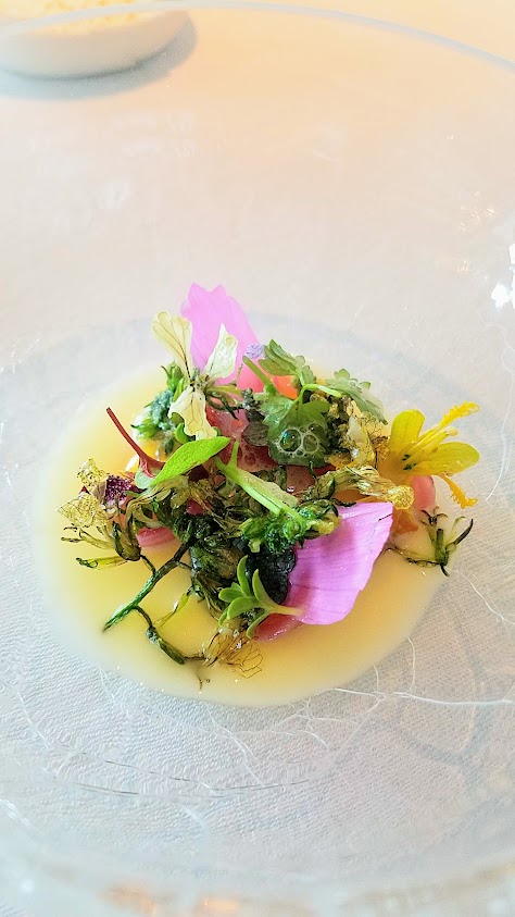 Pickled Onions, Onion Plants, and Melted 'Vesterhavs' Cheese dish at Geranium, a three Michelin star restaurant in Copenhagen