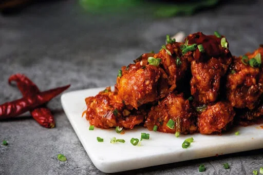 Schezwan Chicken Wings (6pcs)