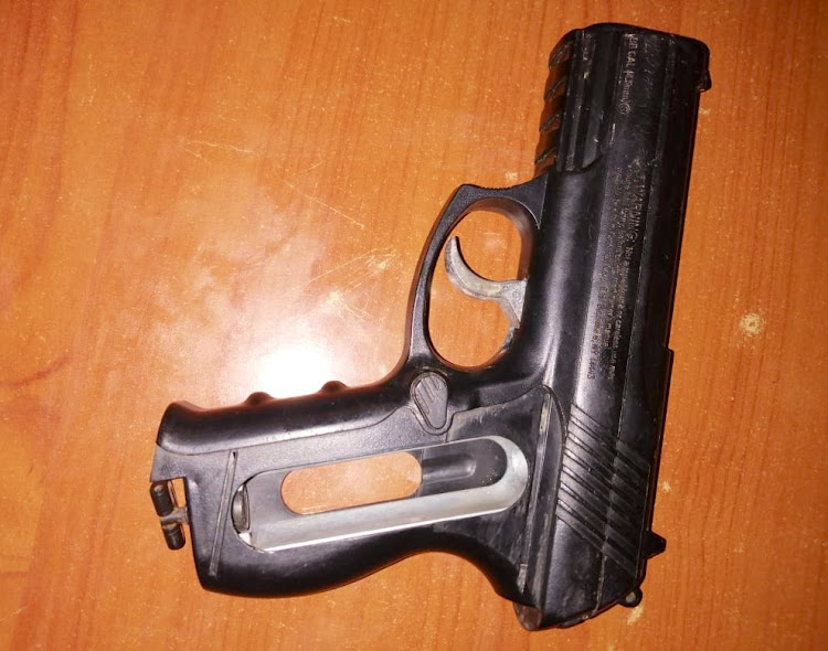 A gas operated pistol make phantom, 23 gas ammunitions & one zinc plated balles at Kiangombe area within Thika West.