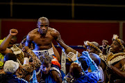 Moruti Mthalane hoisted high as he wins by TKO against Genesis Libranza during the Boxing from Wembley Arena on April 28, 2017 in Johannesburg.