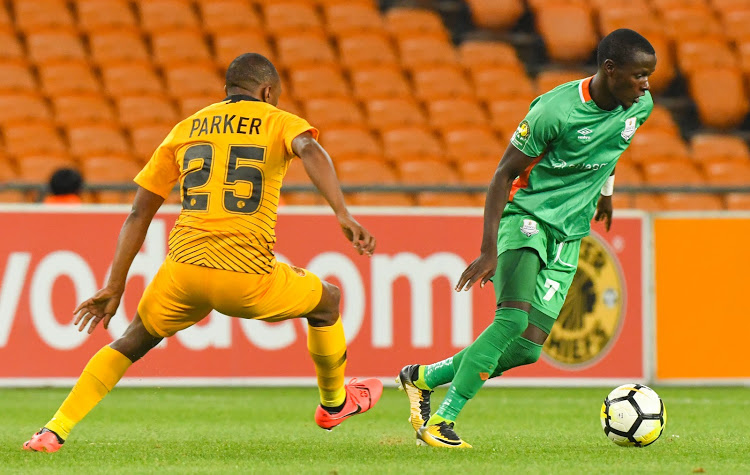 Zesco United goal machine Lazarous Kambole (R) dribbles past Bernard Parker of Kaizer Chiefs during a Caf Confederation Cup meeting at FNB Stadium in Johannesburg on January 19 2019.