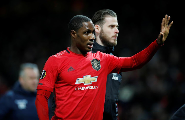 Manchester United on-loan striker Odion Ighalo with goalkeeper David De gea during a past match