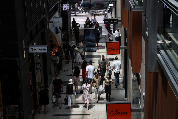 Holiday shoppers in a mall in the city centre of Sydney, Australia, on December 17 2020. Picture: REUTERS/LOREN ELLIOTT