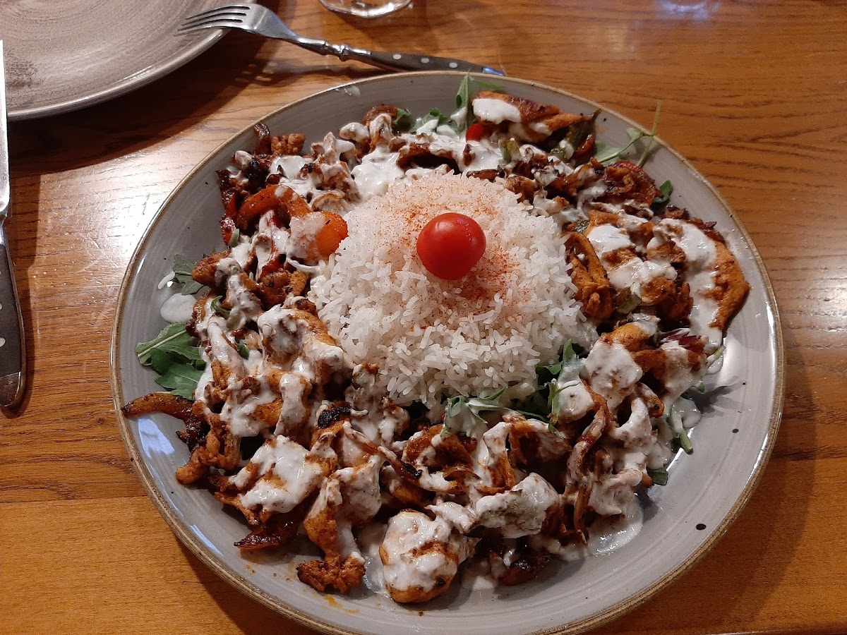 Egyptian Taut (chicken & rice with salad leaves)