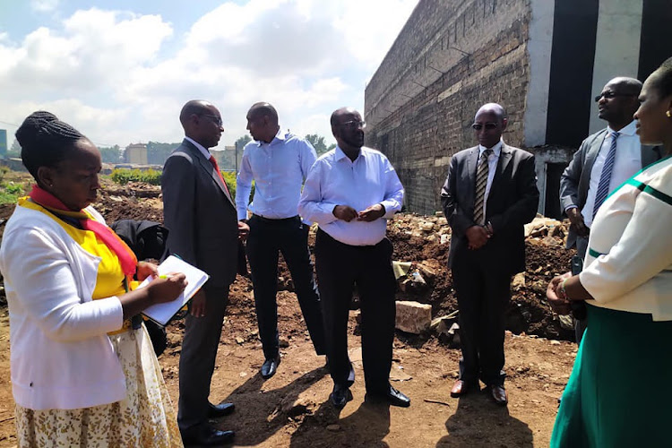 Nairobi County Land and Housing Executive Charles Kerich on site together with contractor and county officials at Jevanjee Estate on February 6, 2020