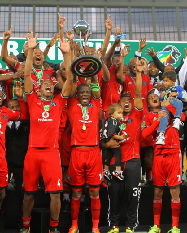 Players of Orlando Pirates celebrating after winning the 2014 Nedbank Cup final match beating Bidvest Wits.