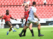 Sanele Nohamba of the Lions teases the Sharks defence with a deft kick at Ellis Park in their URC match. 