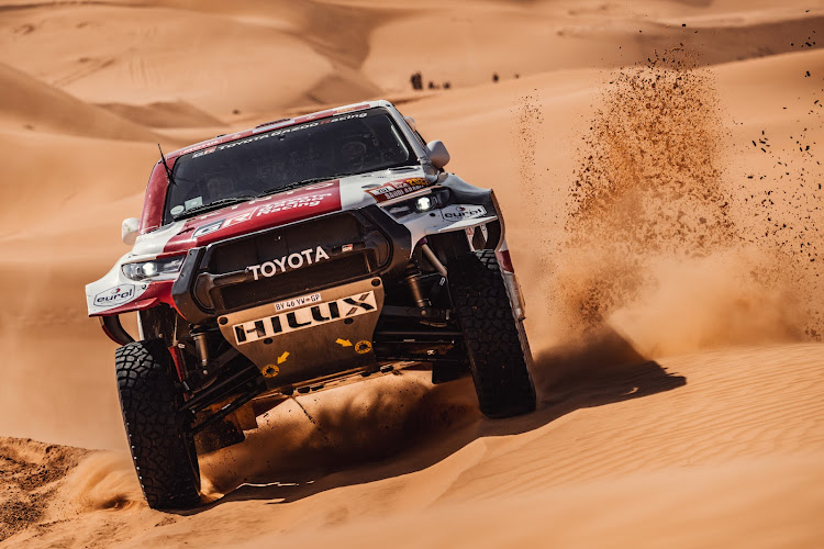 Giniel de Villiers led a Toyota factory team to a one-two-three finish in the 287km timed stage that started and ended in Wadi Ad Dawasir.