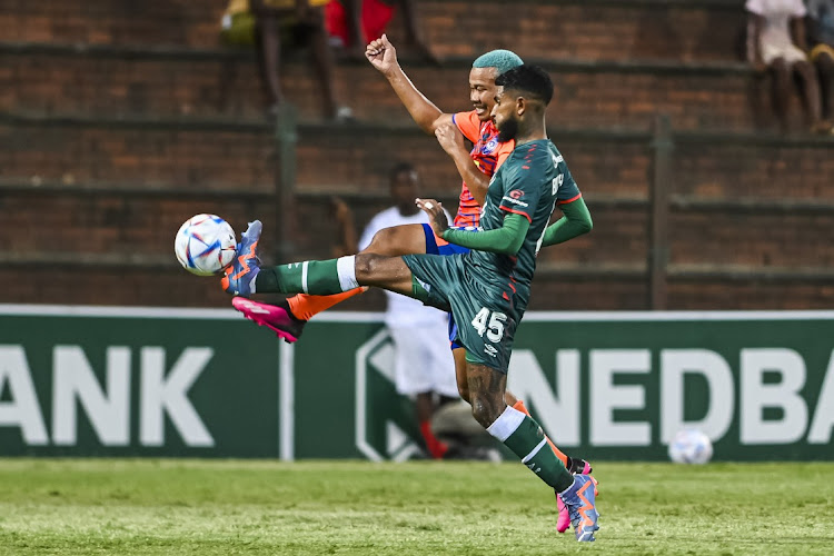 Keagan Buchanan of AmaZulu FC and Will Squaer of Tornado FC during the Nedbank Cup last 32 match between AmaZulu FC and Tornado at King Zwelithini Stadium on February 12, 2023 in Durban.