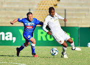 Grant Margeman of SuperSport United tackles Nhlanhla Mgaga of Stellenbosch during their Nedbank Cup quarterfinal match in Cape Town at the weekend. 