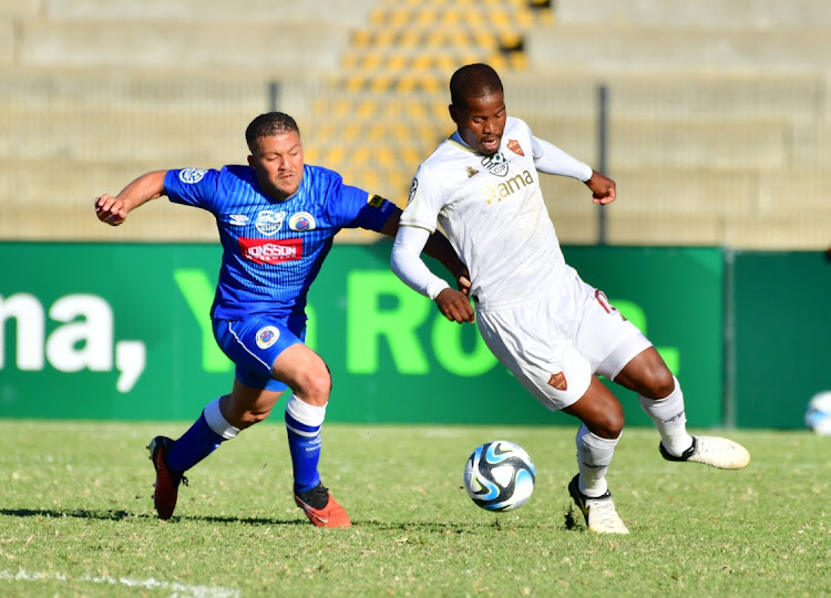 Grant Margeman of SuperSport United tackles Nhlanhla Mgaga of Stellenbosch during their Nedbank Cup quarterfinal match in Cape Town at the weekend.