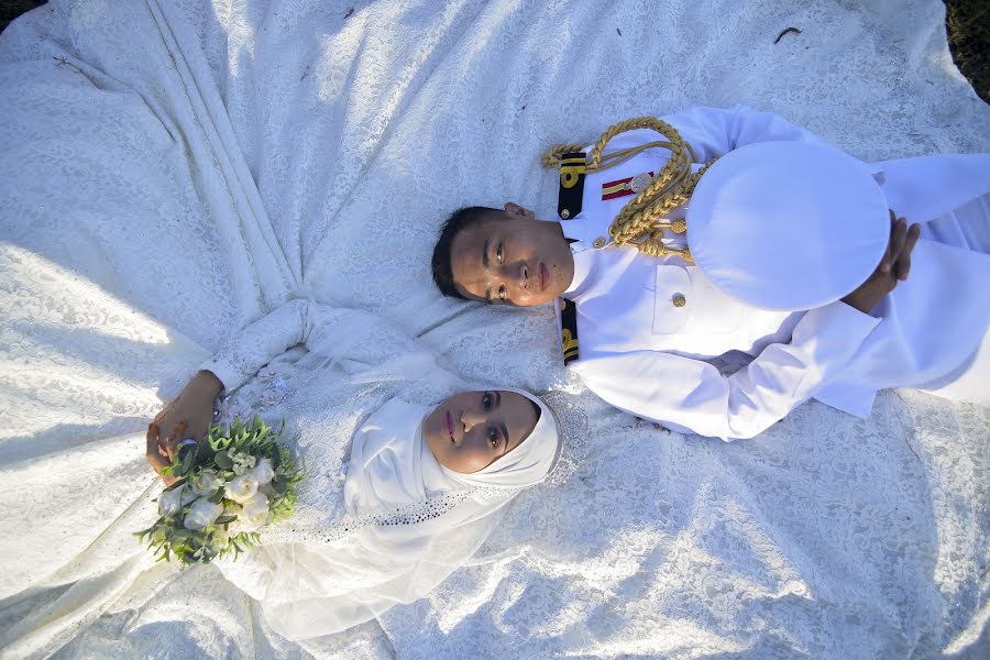 結婚式の写真家Amir Hizbullah (amirhizbullah)。2019 3月8日の写真