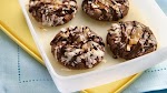 Chocolate-Coconut Thumbprint Cookies was pinched from <a href="http://www.pillsbury.com/recipes/chocolate-coconut-thumbprint-cookies/09157990-4a4a-413c-833f-34484eba4e9c" target="_blank">www.pillsbury.com.</a>