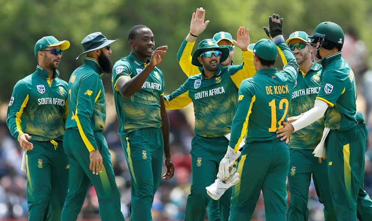 Kagiso Rabada celebrates with his teammates after taking the wicket of Sri Lanka's Shehan Jayasuriya during the first one day international on July 29, 2018.