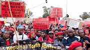 Demonstrators protest outside Megawatt Park, Sunninghill, in June.