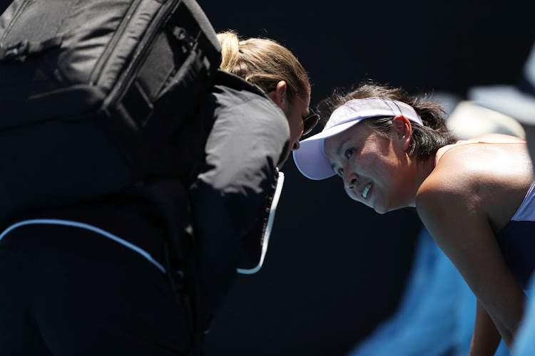 File picture of Shuai Peng of China being attended to by a trainer during her Women's Singles first round match against Nao Hibino of Japan at the 2020 Australian Open at Melbourne Park.