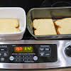 Thumbnail For Slices Of White Bread In The Bottom Of Two Loaf Pans.