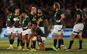 South Africa's Damian Willemse and teammates look dejected after the Rugby Championship match against New Zealand at Loftus Versfeld in Pretoria on October 6, 2018.